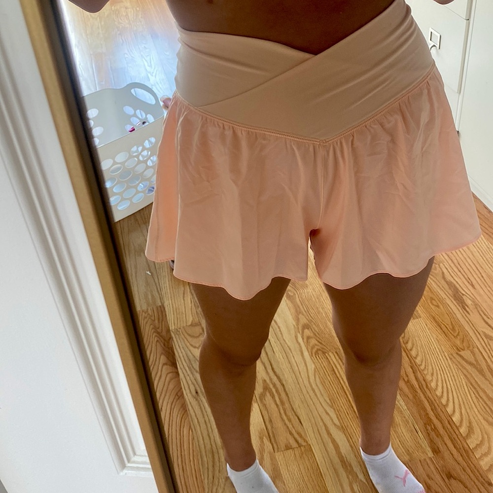 OFFLINE By Aerie Real Me Crossover Flowy Short in color light orange